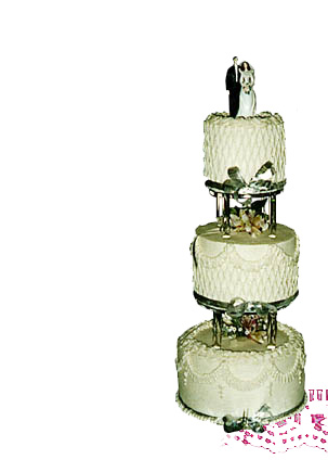 Photograph of a three tiered traditional wedding cake
