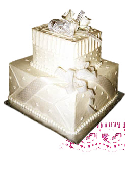 Photograph of white two tiered package shaped cake.
			
