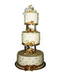 traditional wedding cake with separators and gold trim